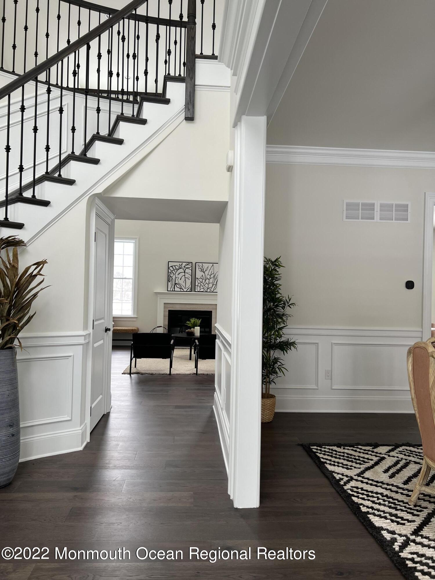66 Windermere Road Lincroft, NJ 07738 - Photo 8 of 61 a view of entryway and hall with wooden floor