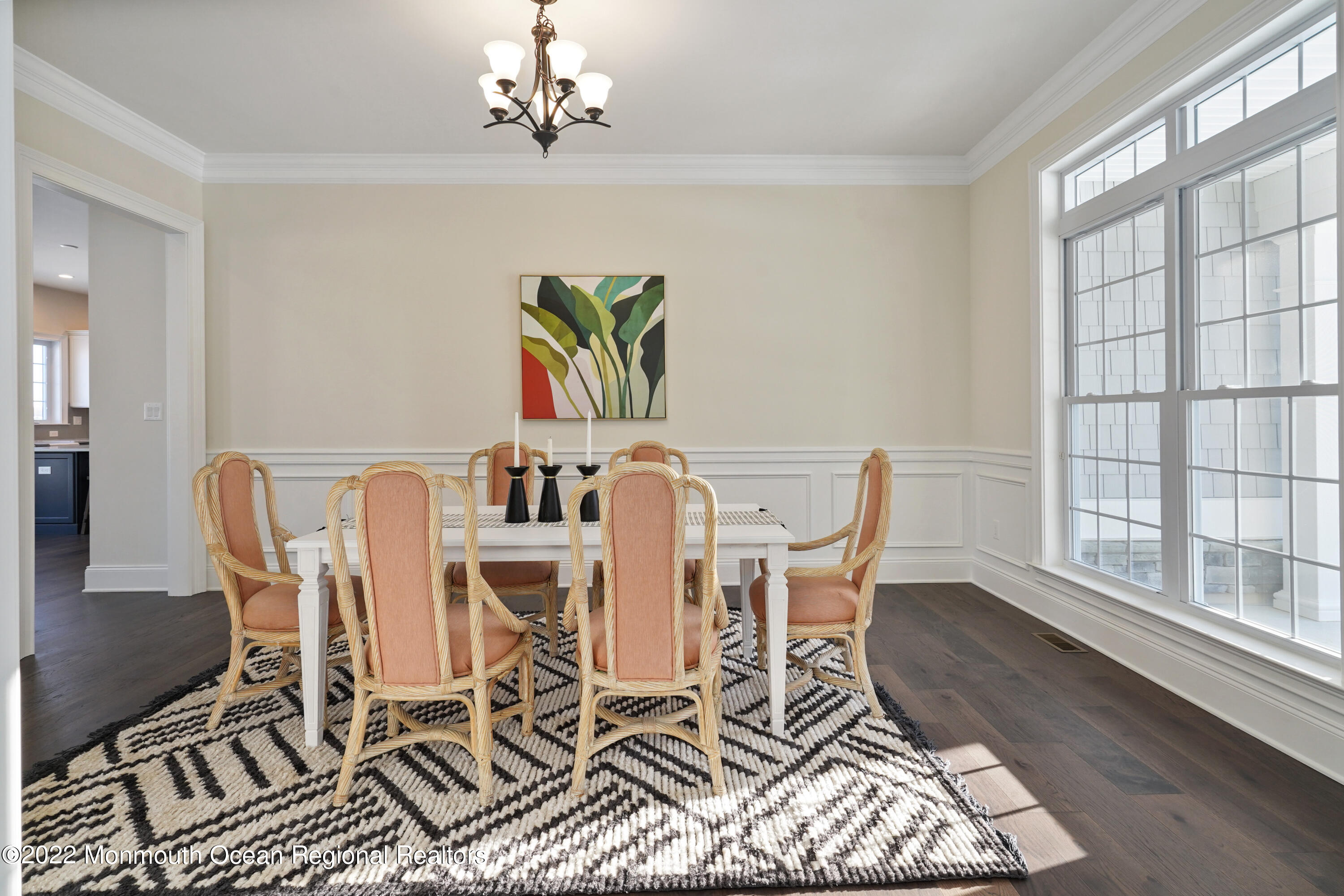 66 Windermere Road Lincroft, NJ 07738 - Photo 9 of 61 a view of a dining room with furniture wooden floor and a chandelier
