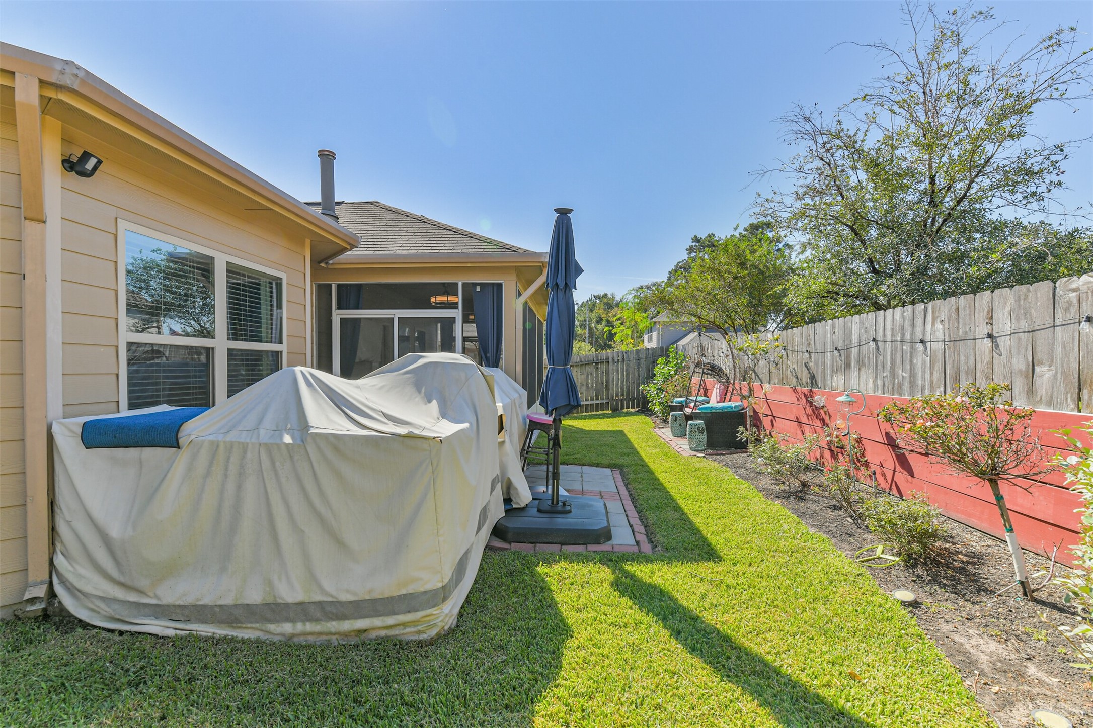 24047 Schults Meadow Lane Spring, TX 77389 - Photo 45 of 47 a view of a house with backyard