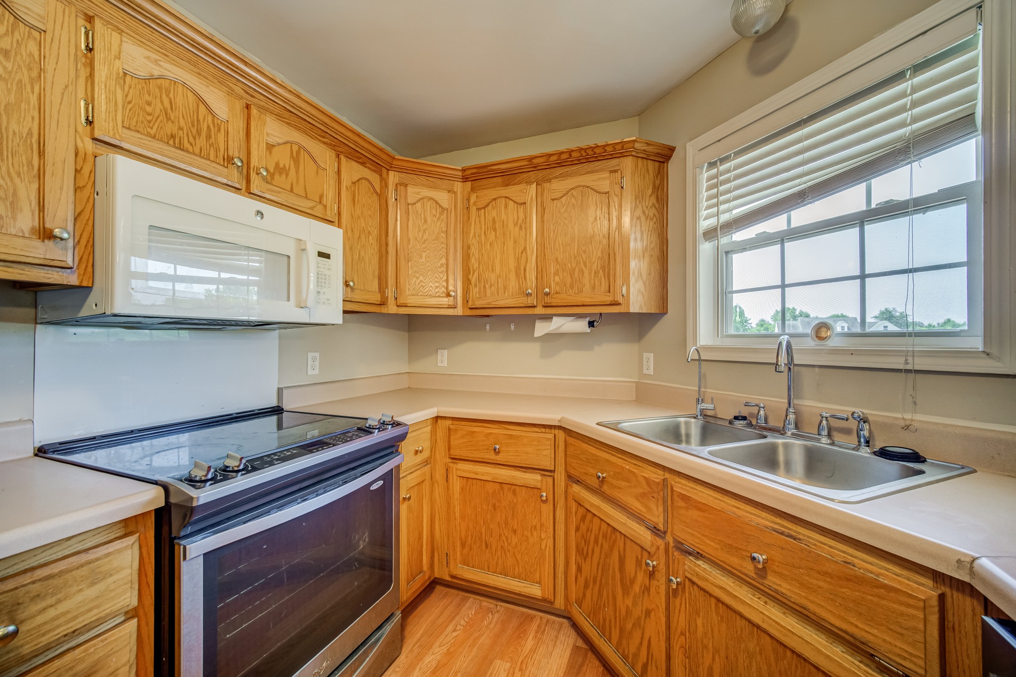 5160 Minnis Road Springfield, TN 37172 - Photo 12 of 31 a kitchen with stainless steel appliances granite countertop a sink a stove and cabinets