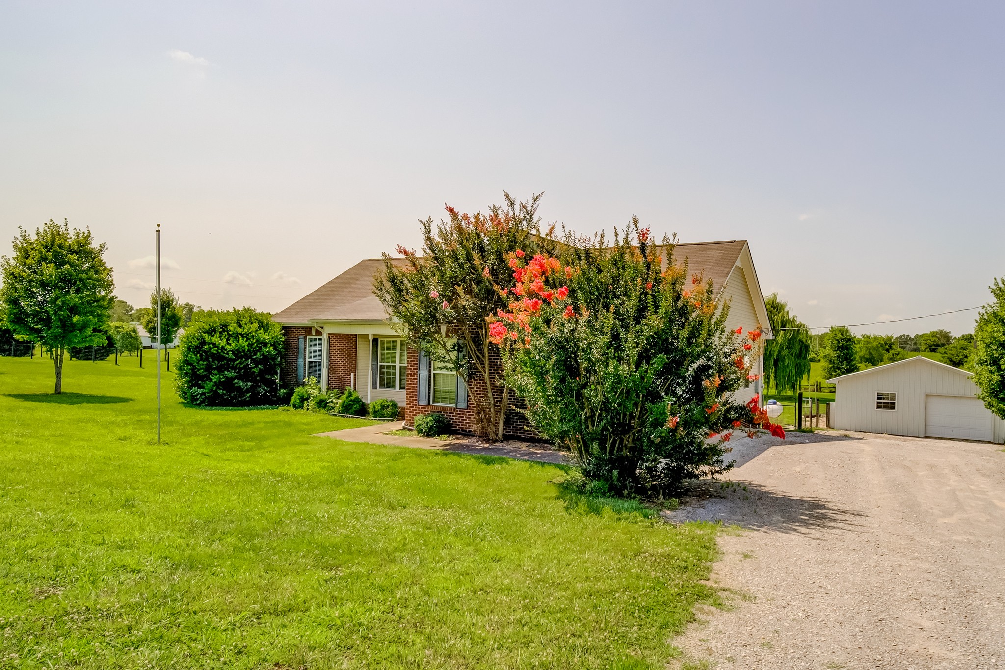 5160 Minnis Road Springfield, TN 37172 - Photo 4 of 31 a front view of a house with a yard and garage