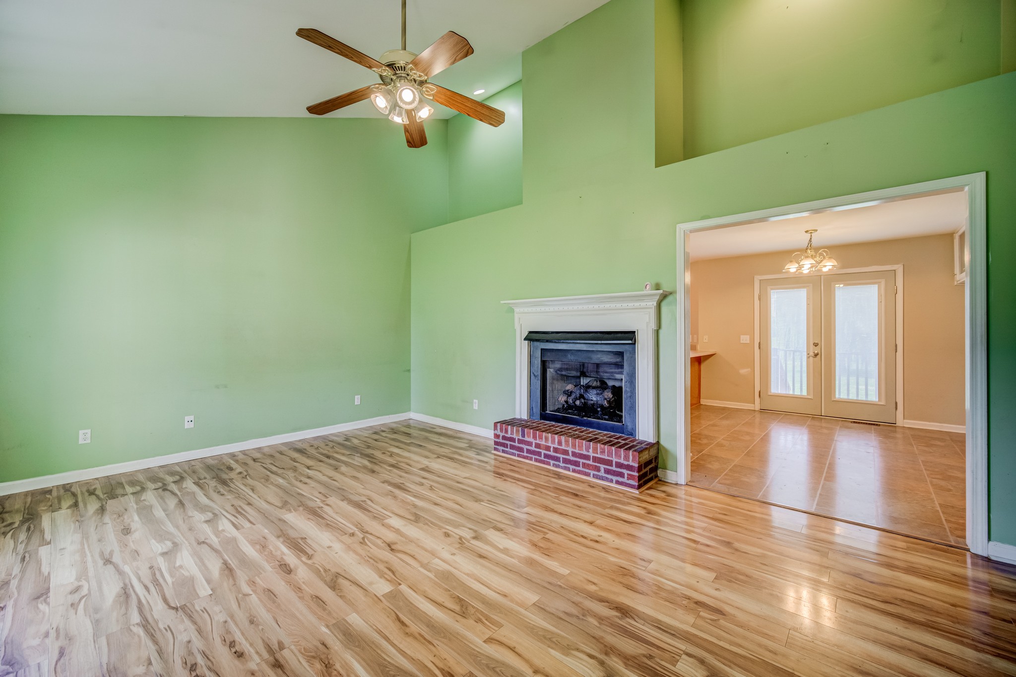 5160 Minnis Road Springfield, TN 37172 - Photo 6 of 31 a view of empty room with wooden floor and fan