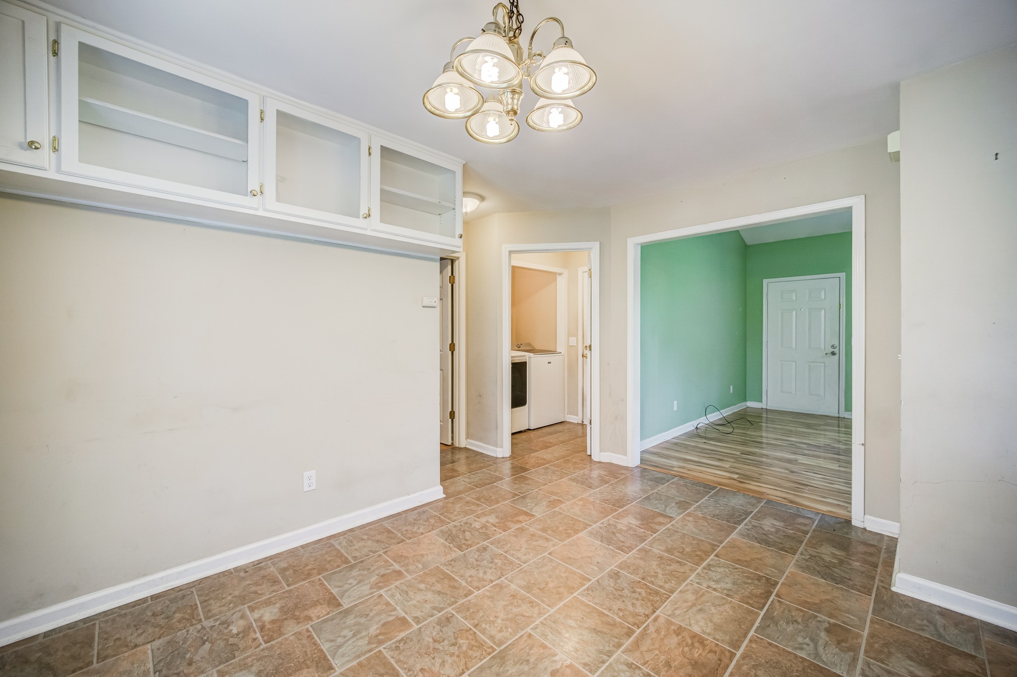5160 Minnis Road Springfield, TN 37172 - Photo 10 of 31 a view of an empty room with a chandelier