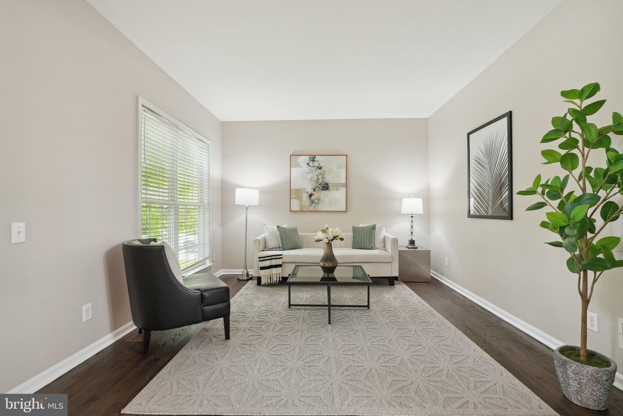 51 Knickerbocker Lane Malvern, PA 19355 - Photo 14 of 57 a living room with furniture and a potted plant