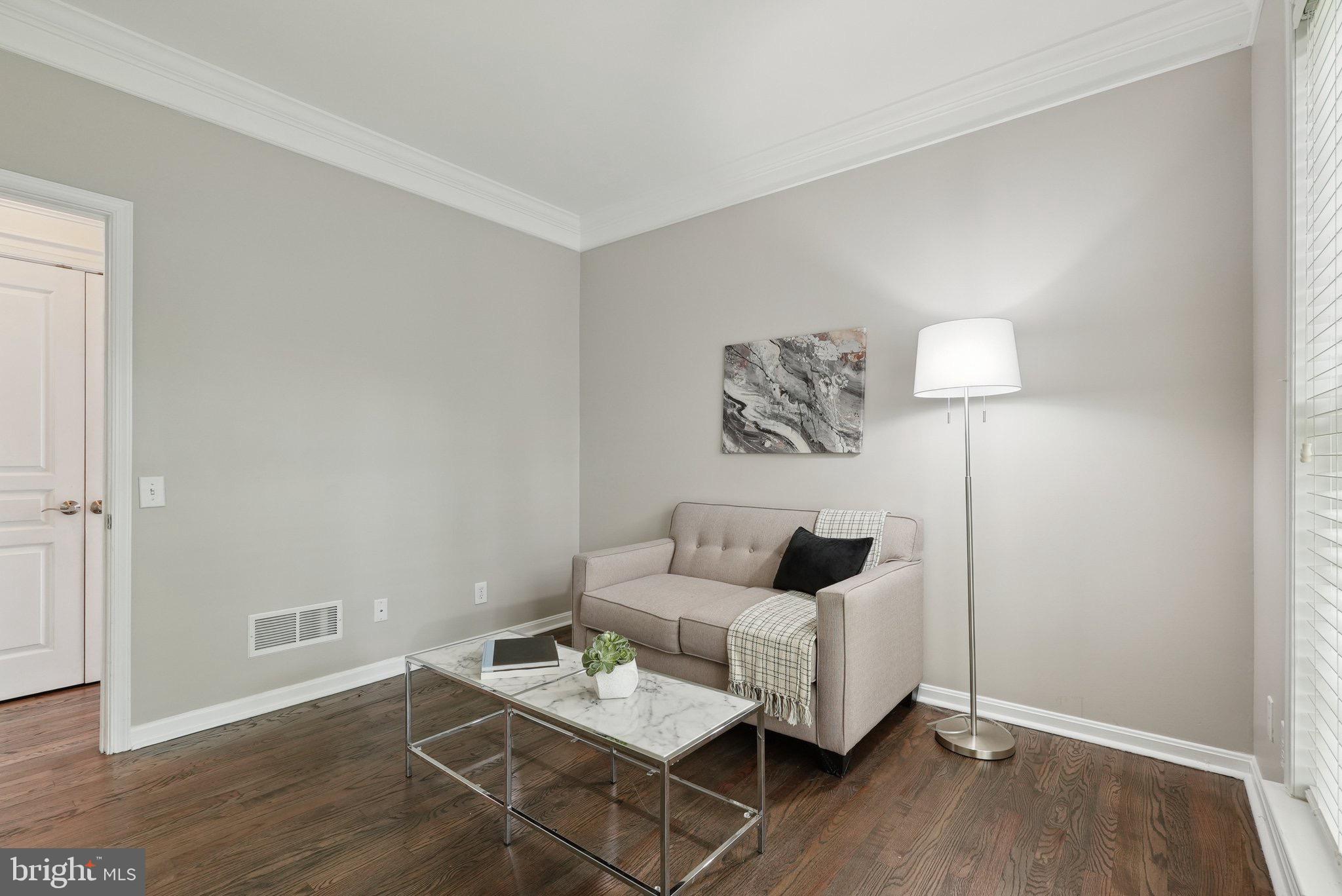 51 Knickerbocker Lane Malvern, PA 19355 - Photo 26 of 57 a living room with furniture and a wooden floor