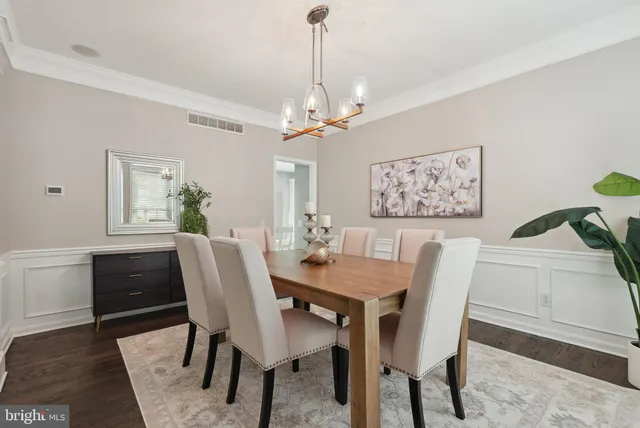 a spacious bedroom with a bed and a couch