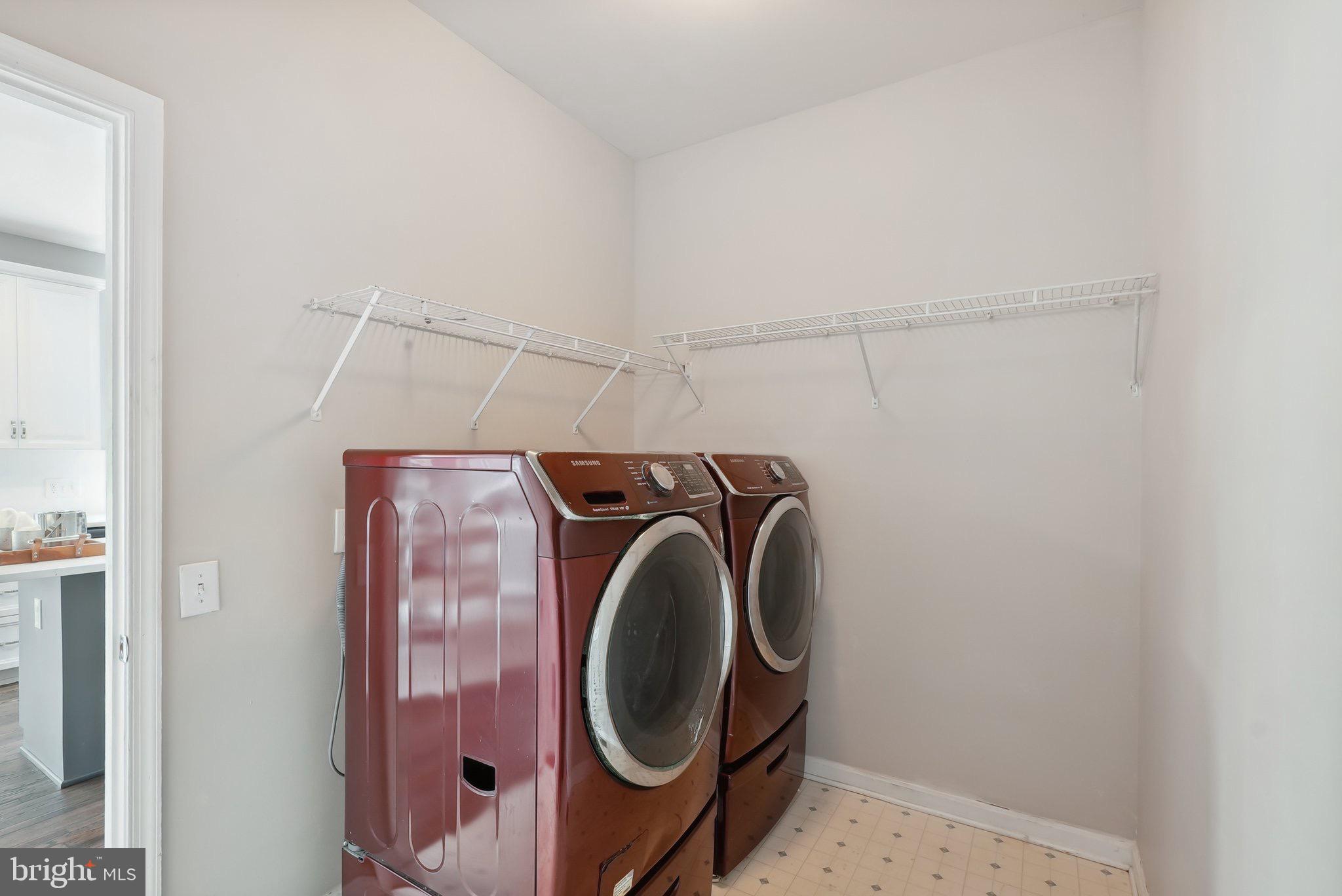 51 Knickerbocker Lane Malvern, PA 19355 - Photo 32 of 57 a utility room with dryer and washer