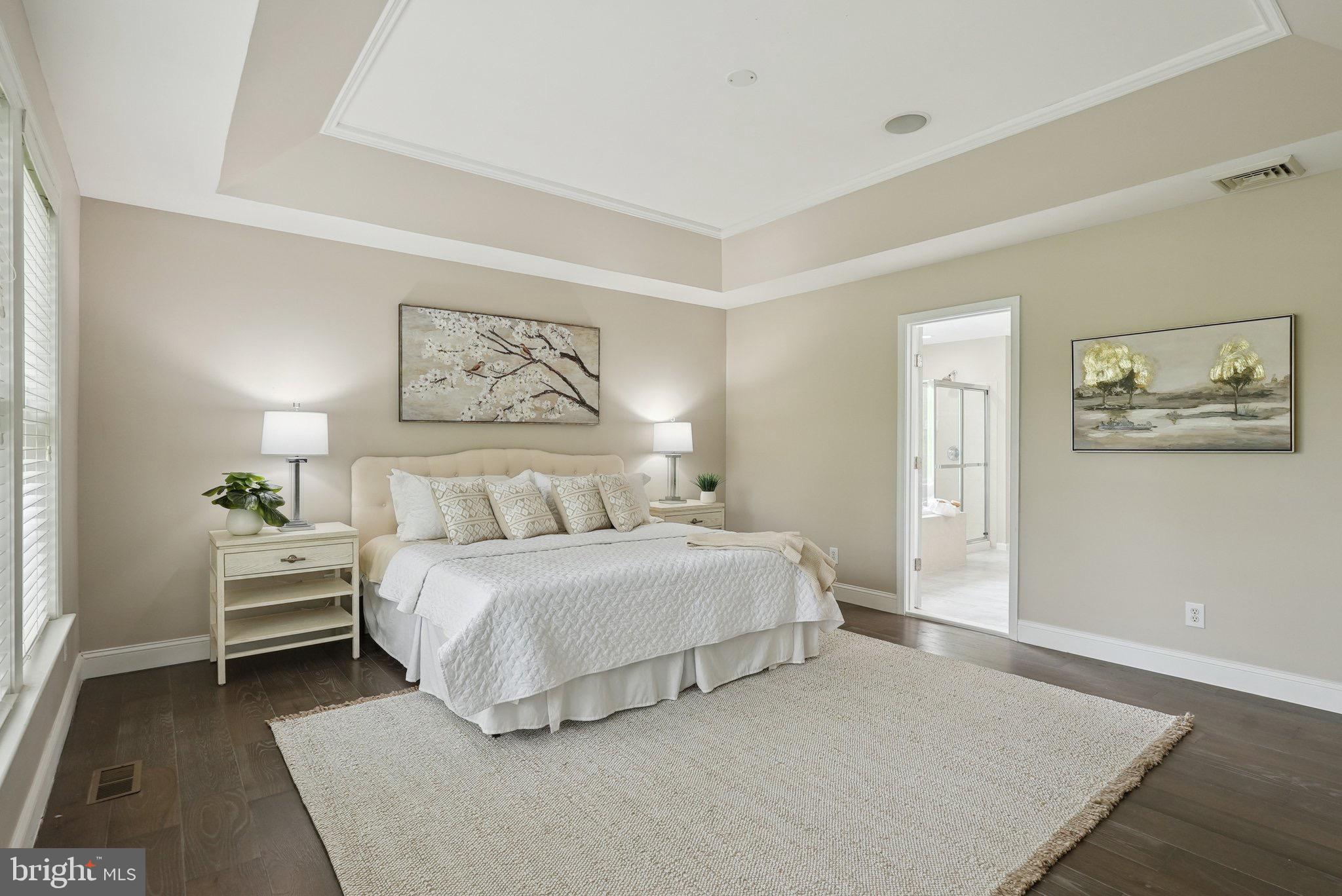 51 Knickerbocker Lane Malvern, PA 19355 - Photo 34 of 57 a spacious bedroom with a bed and a couch