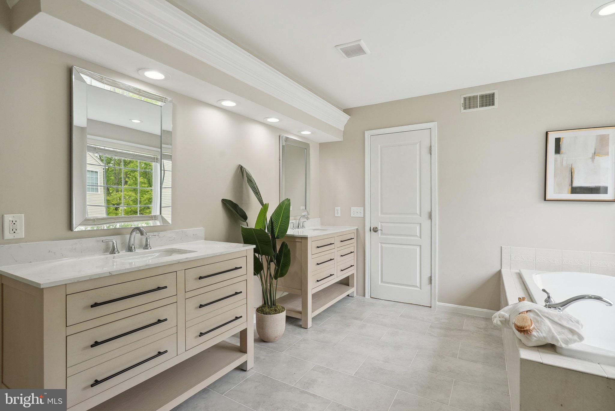 51 Knickerbocker Lane Malvern, PA 19355 - Photo 38 of 57 a bathroom with a sink and a mirror