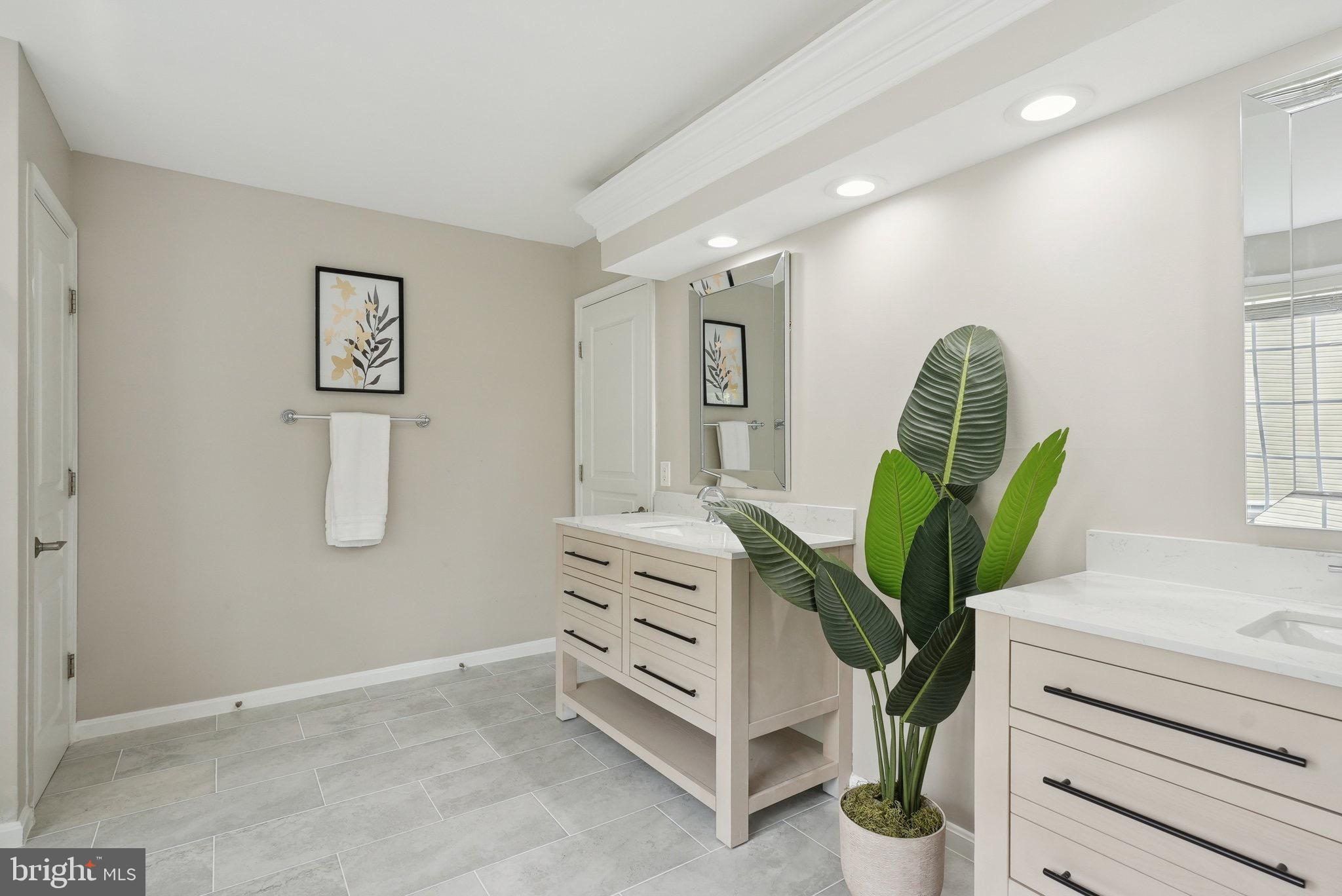 51 Knickerbocker Lane Malvern, PA 19355 - Photo 39 of 57 a view of a hallway with paintings on the wall