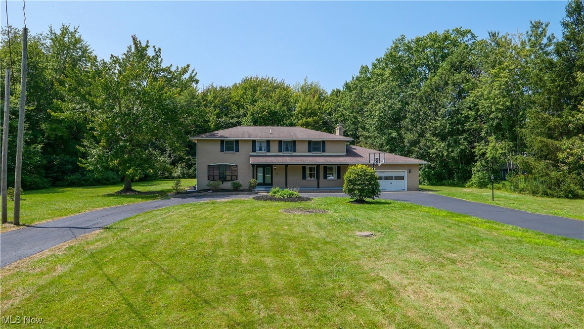 3111 Blake Road Ashtabula, OH 44004 - Photo 29 of 39 View of front of house with a front yard
