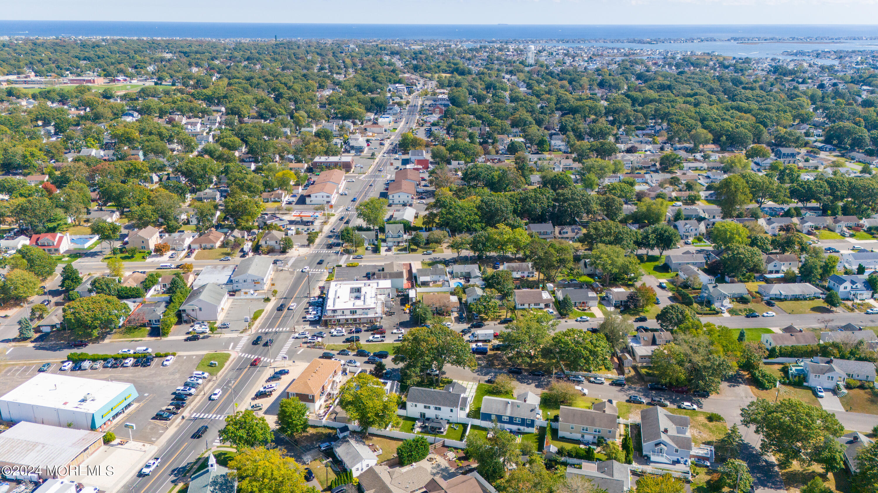 1307 Mossbank Road Point Pleasant, NJ 08742 - Photo 50 of 56 an aerial view of a city with lots of residential buildings