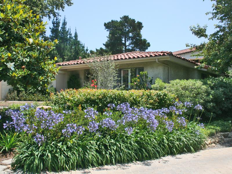 858 Via Granada Santa Barbara, CA 93103 - Photo 1 of 6 a view of a garden with a fountain
