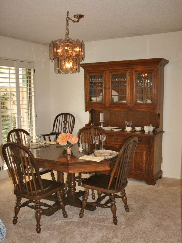 858 Via Granada Santa Barbara, CA 93103 - Photo 3 of 6 a view of a dining room with furniture and chandelier