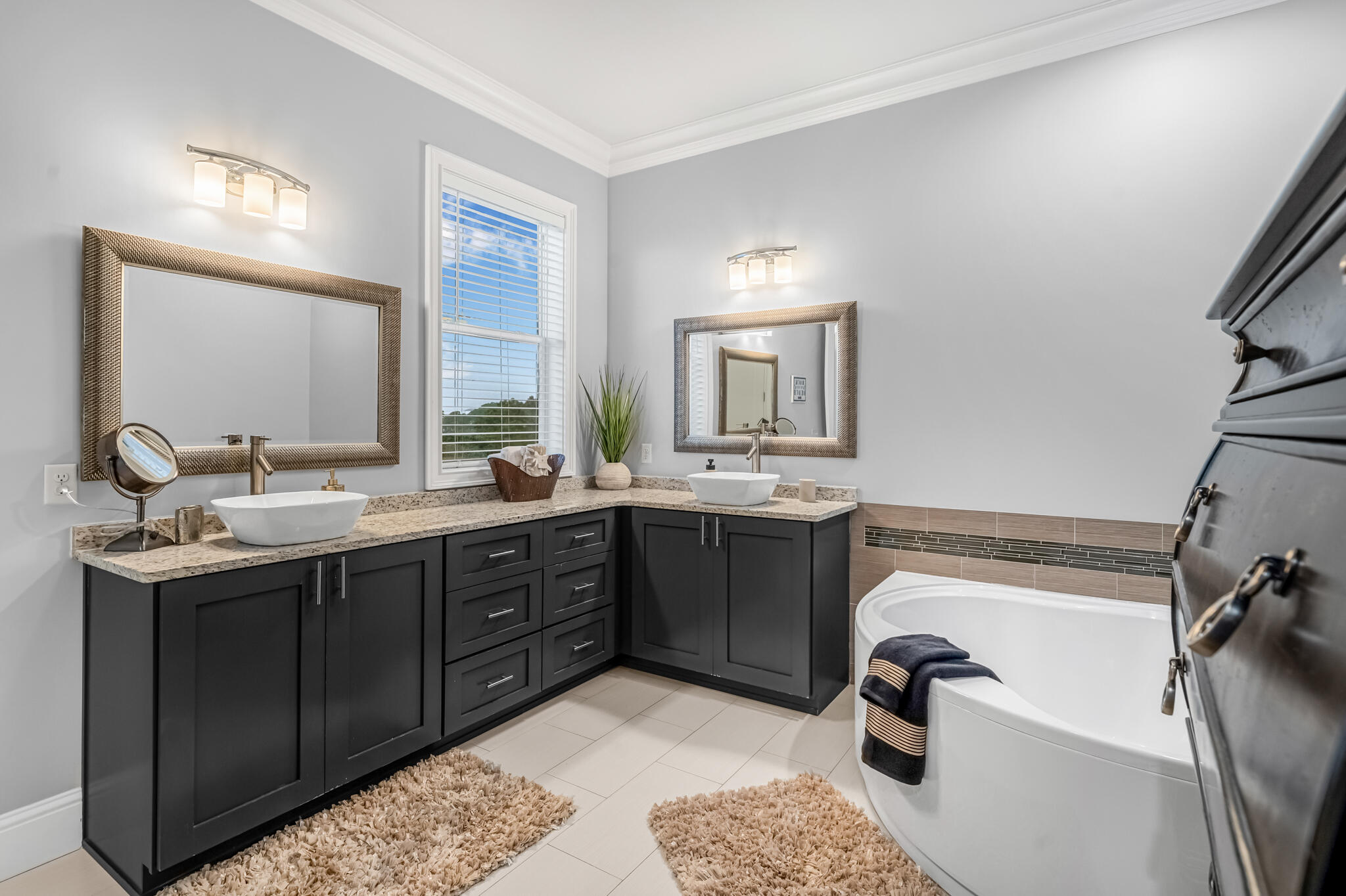 5732 West County Highway 30A Santa Rosa Beach, FL 32459 - Photo 12 of 43 a bathroom with a sink double vanity