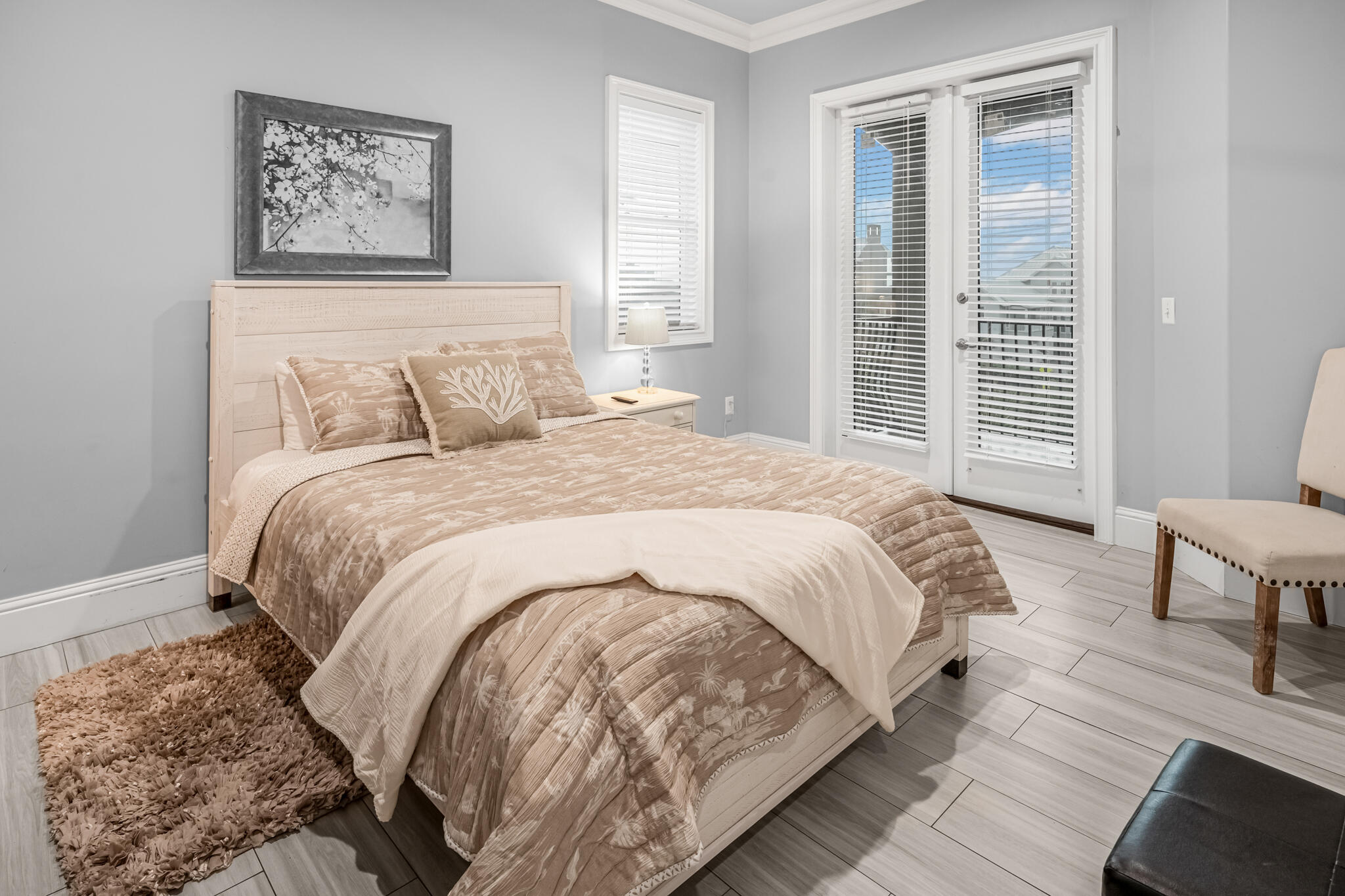 5732 West County Highway 30A Santa Rosa Beach, FL 32459 - Photo 14 of 43 a large bed sitting in a bedroom next to a window