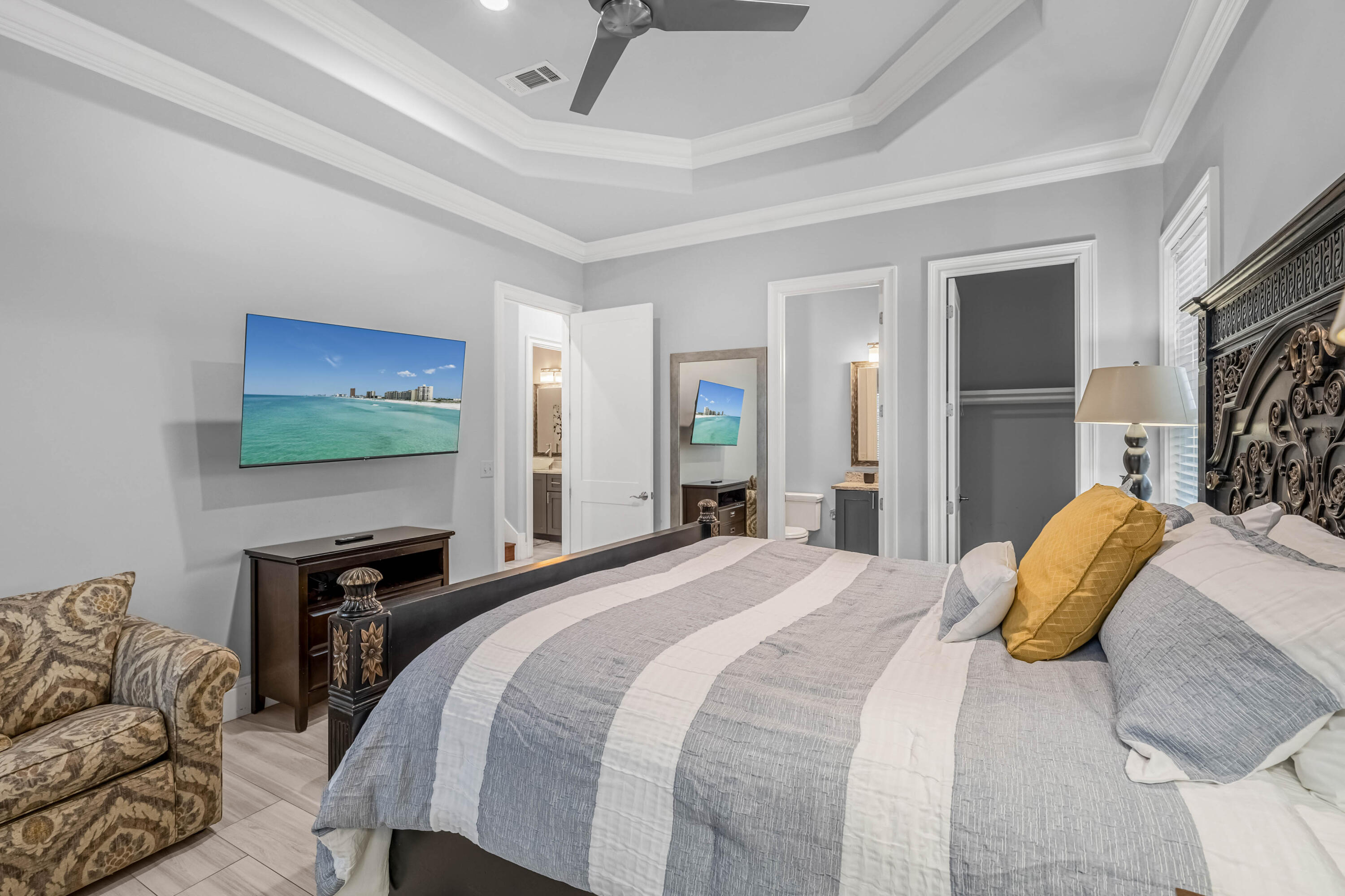 5732 West County Highway 30A Santa Rosa Beach, FL 32459 - Photo 17 of 43 a bedroom with a bed and a flat screen tv