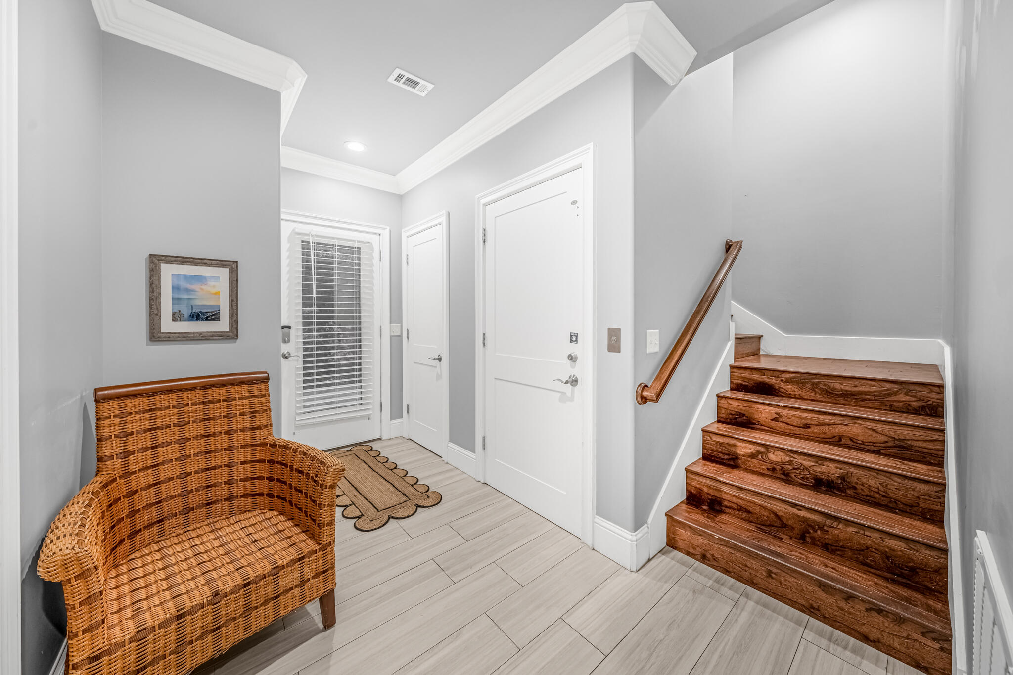 5732 West County Highway 30A Santa Rosa Beach, FL 32459 - Photo 31 of 43 a bedroom with a bed and wooden floor