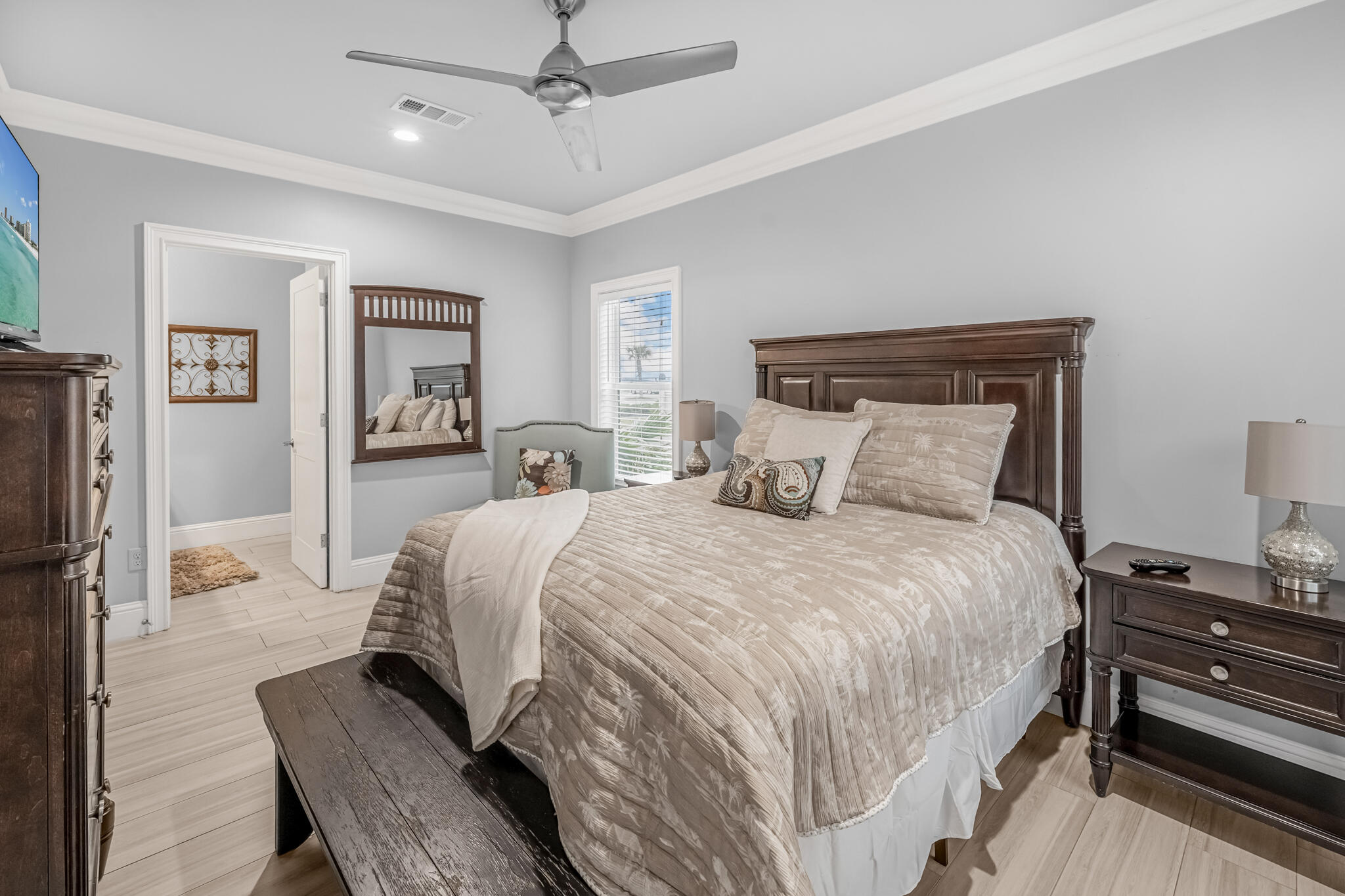 5732 West County Highway 30A Santa Rosa Beach, FL 32459 - Photo 32 of 43 a bedroom with bed and wooden floor