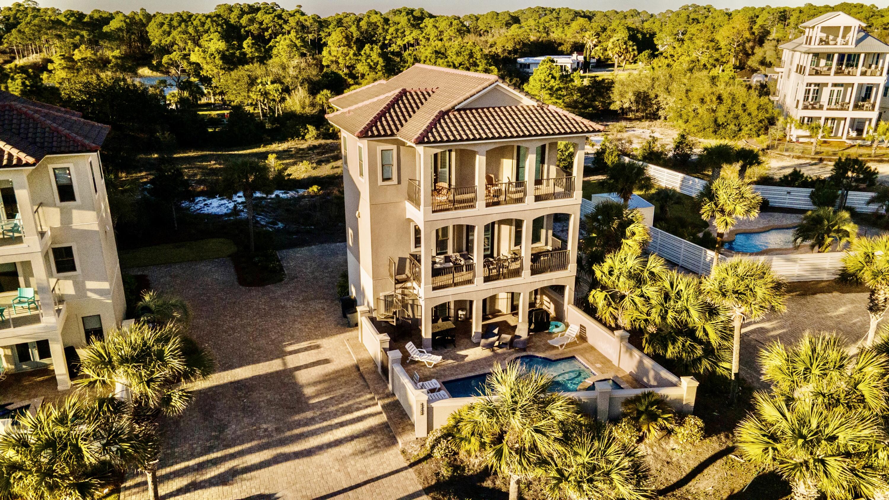 5732 West County Highway 30A Santa Rosa Beach, FL 32459 - Photo 5 of 43 front view of a house with a yard
