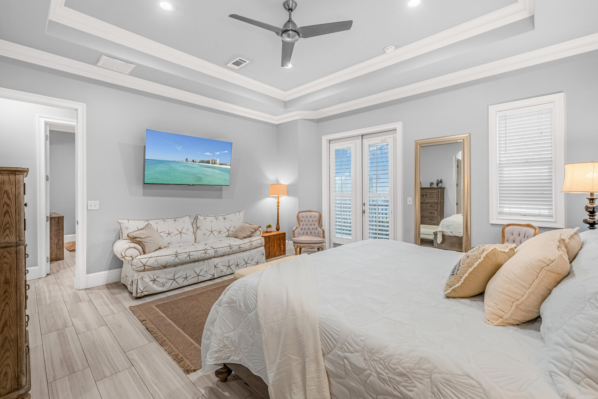 5732 West County Highway 30A Santa Rosa Beach, FL 32459 - Photo 10 of 43 a spacious bedroom with a bed couch and a window