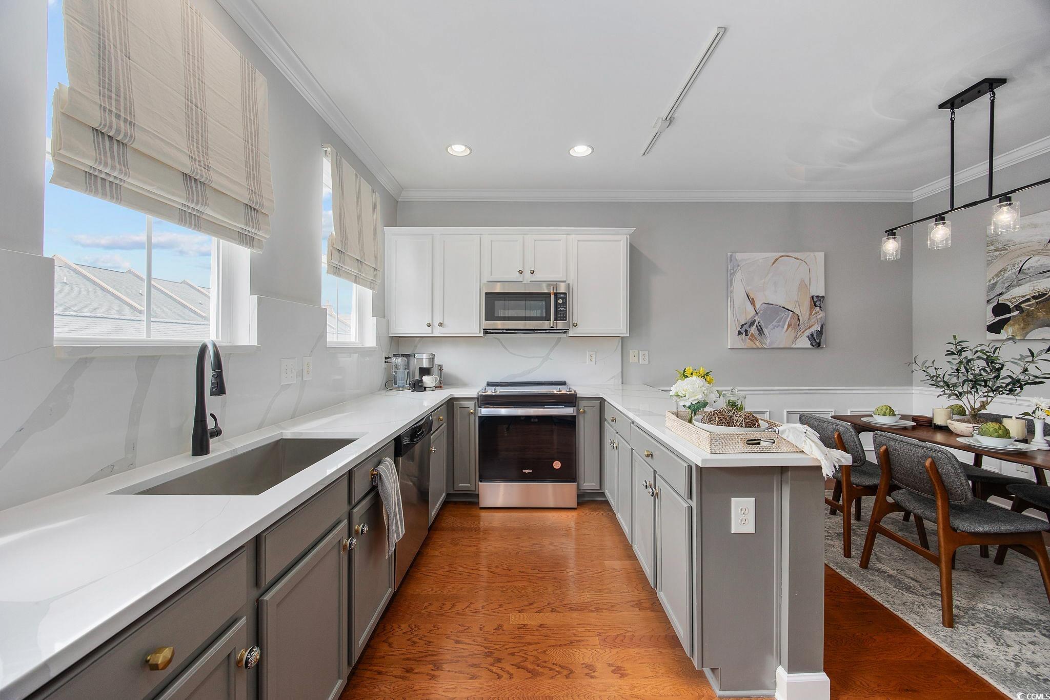 751 Murray Avenue, Unit 751 Myrtle Beach, SC 29577 - Photo 11 of 34 Kitchen with appliances with stainless steel finis