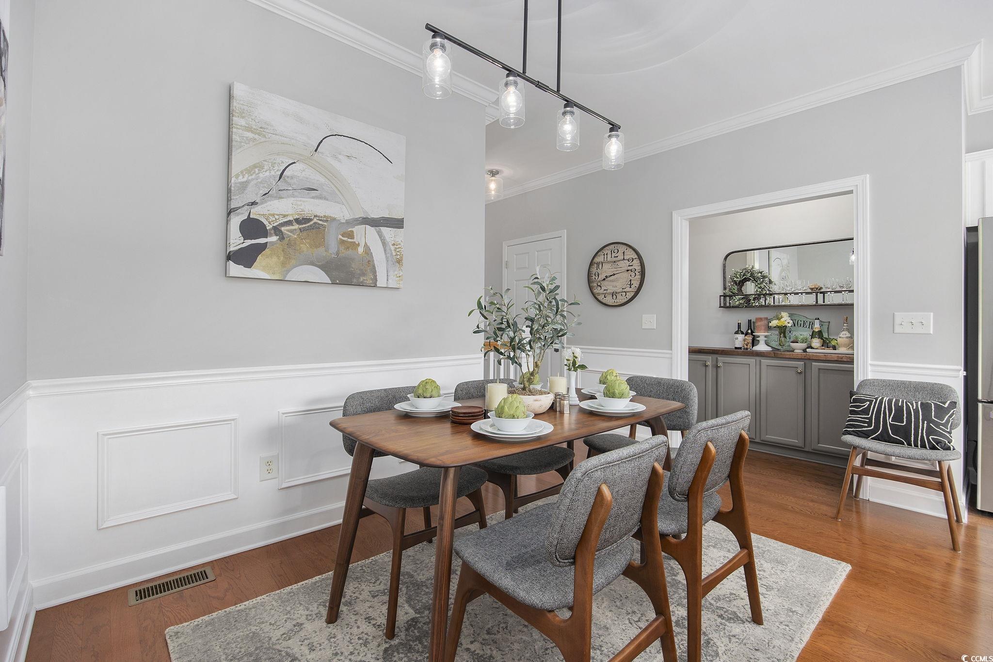 751 Murray Avenue, Unit 751 Myrtle Beach, SC 29577 - Photo 13 of 34 Dining room featuring light hardwood / wood-style