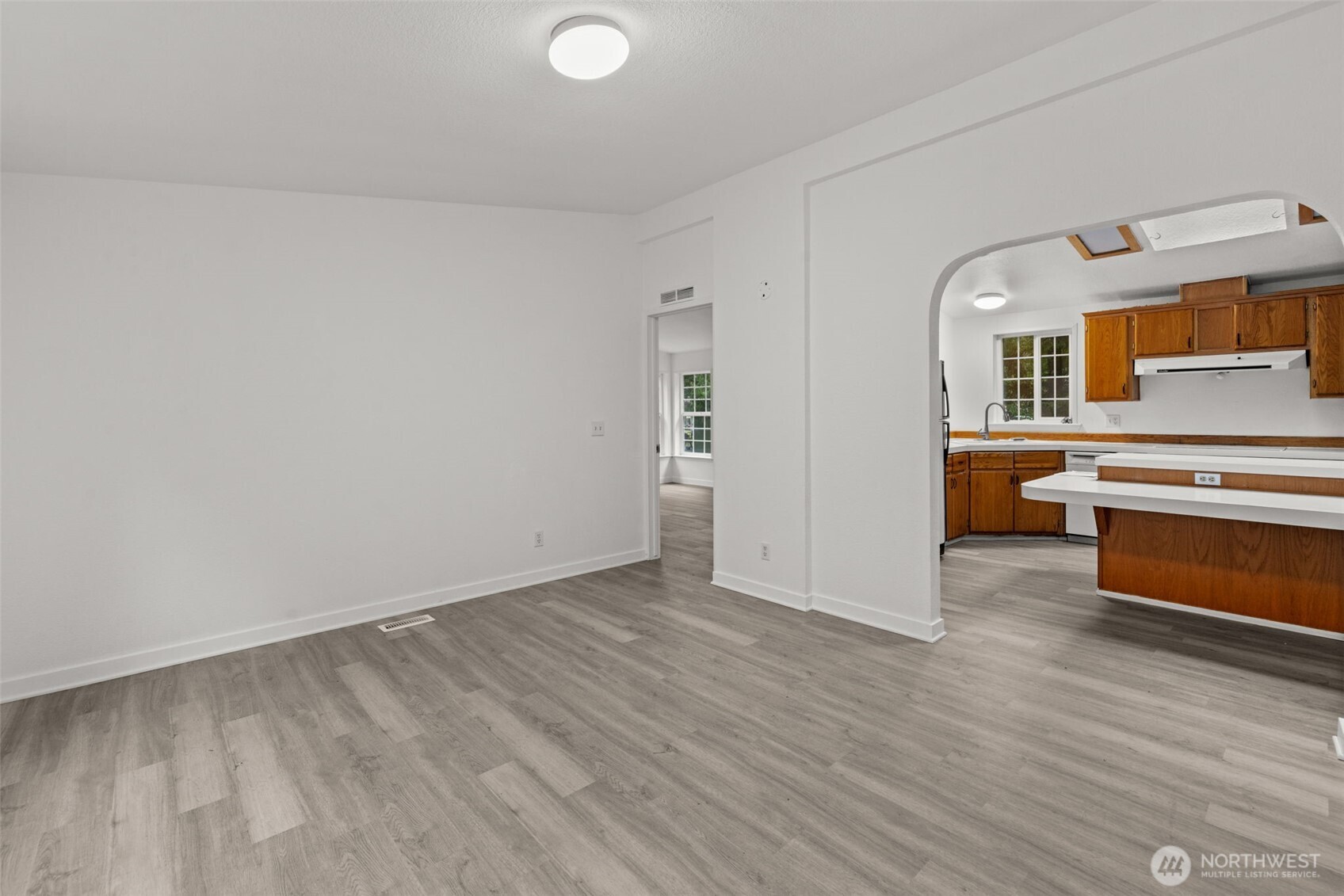 35952 Stackpole Road Ocean Park, WA 98640 - Photo 15 of 40 a view of a kitchen with wooden floor and a sink