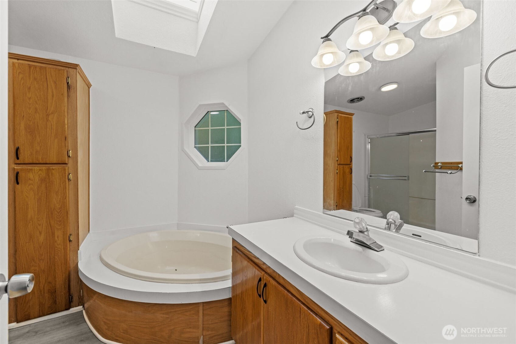 35952 Stackpole Road Ocean Park, WA 98640 - Photo 16 of 40 a bathroom with a sink a toilet and shower