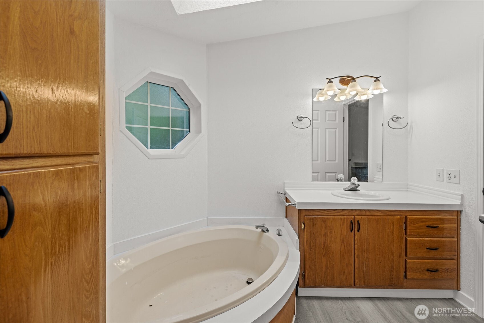 35952 Stackpole Road Ocean Park, WA 98640 - Photo 18 of 40 a bathroom with a sink and a mirror
