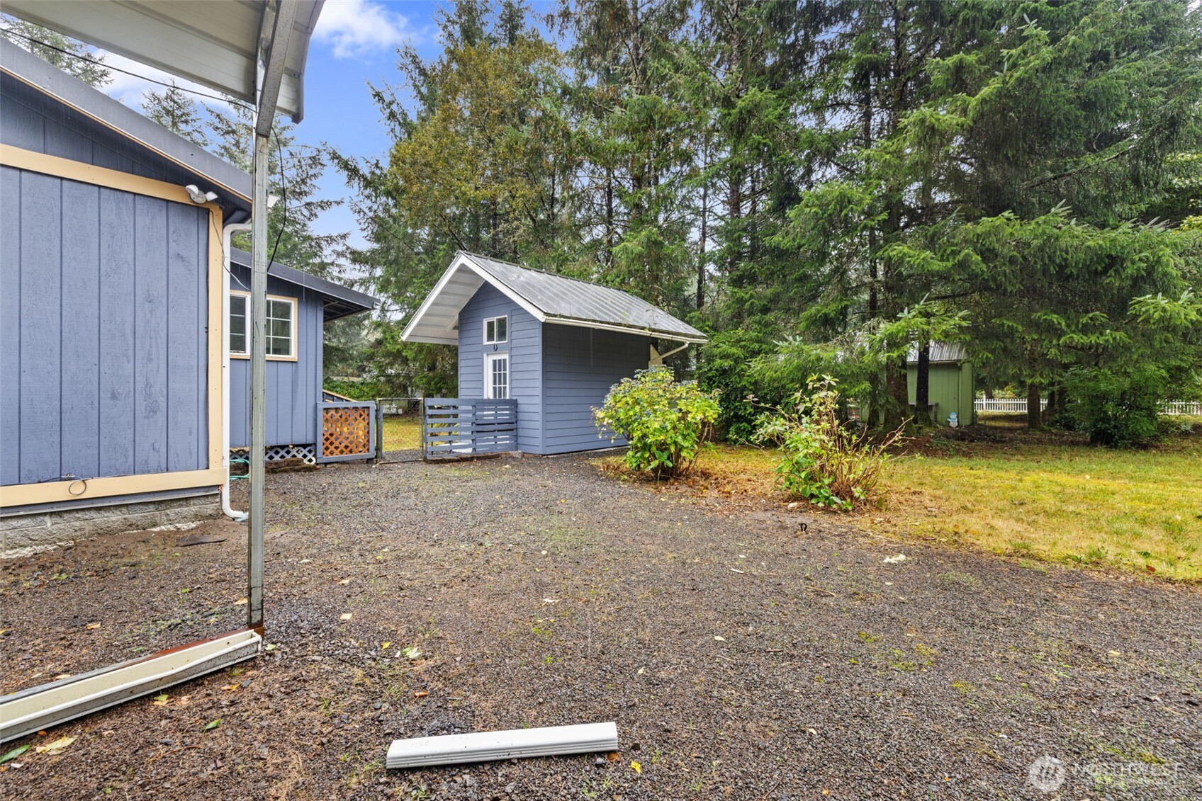 35952 Stackpole Road Ocean Park, WA 98640 - Photo 40 of 40 a view of a house with backyard and trees