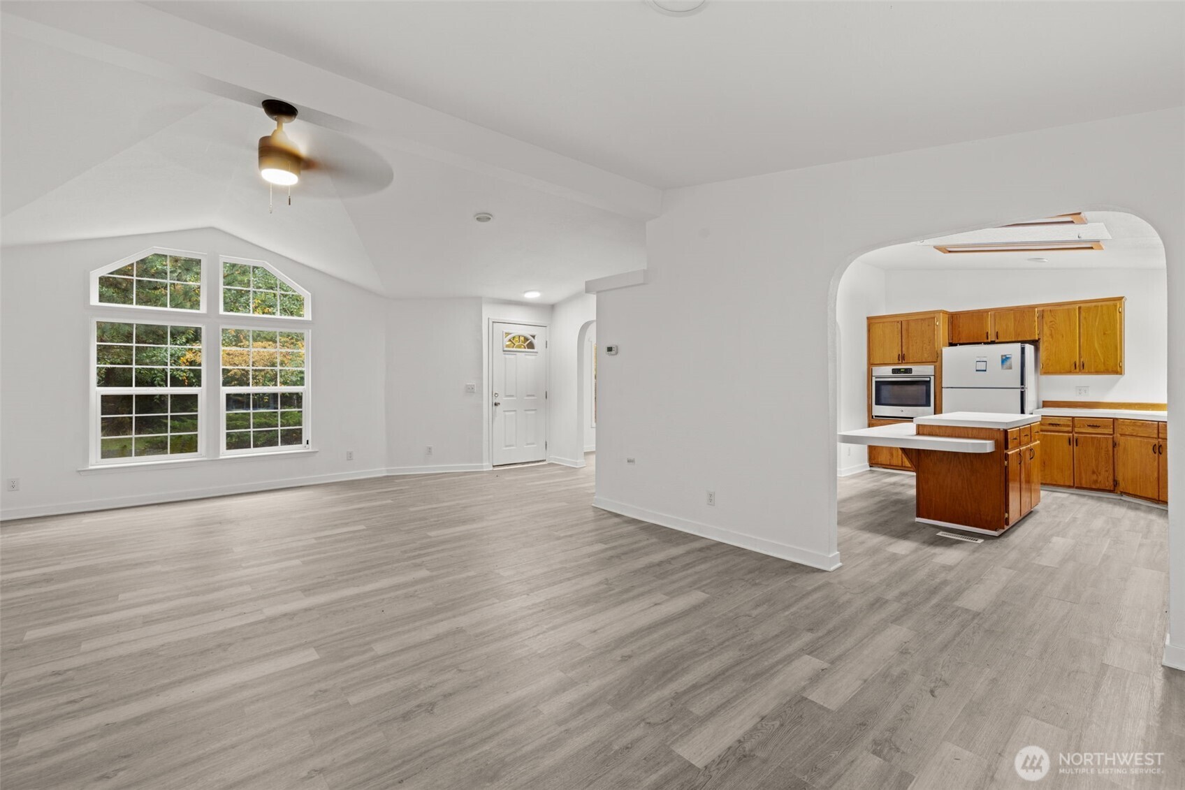 35952 Stackpole Road Ocean Park, WA 98640 - Photo 8 of 40 wooden floor in an empty room with a window and wooden floor