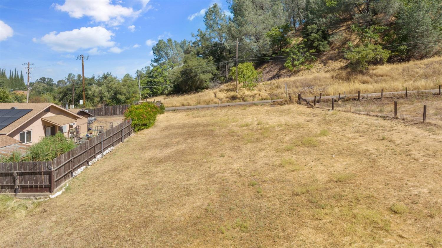 11900 Sutter Hill Road Sutter Creek, CA 95685 - Photo 11 of 32 a view of a yard with an trees
