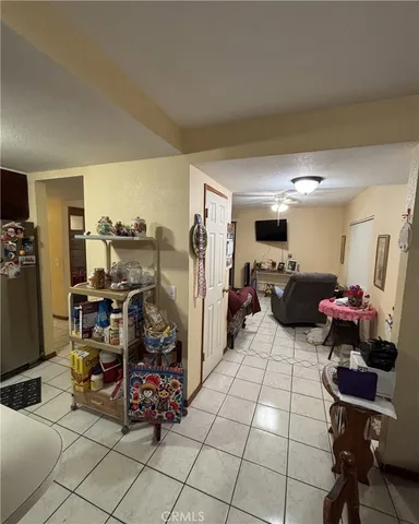 a bathroom with a double vanity sink a mirror and a bathtub
