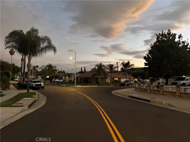 a view of a dining room with furniture and window
