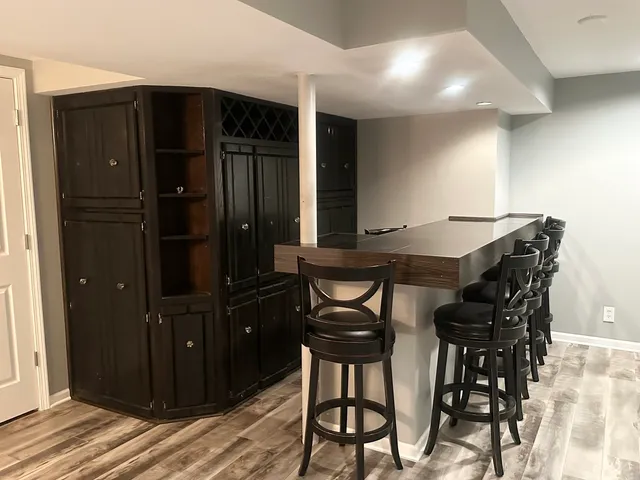 a view of empty room with a fireplace