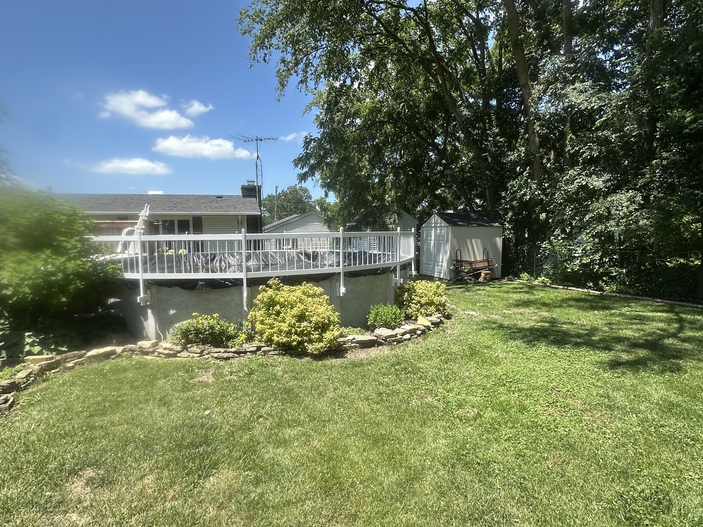 516 Whelan Street Lockport, IL 60441 - Photo 26 of 27 a view of a house with a yard and sitting area