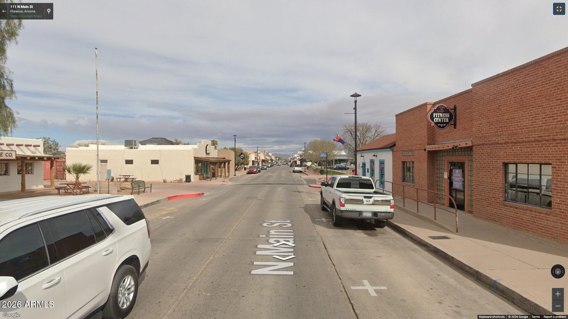 110 North Main Street Florence, AZ 85132 - Photo 12 of 19 a view of a street with cars