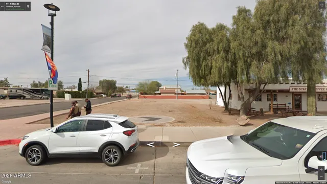 a city view with lot of cars and buildings