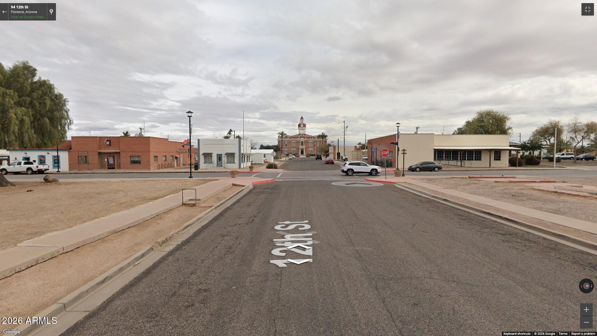 110 North Main Street Florence, AZ 85132 - Photo 17 of 19 a city view with lot of cars and buildings