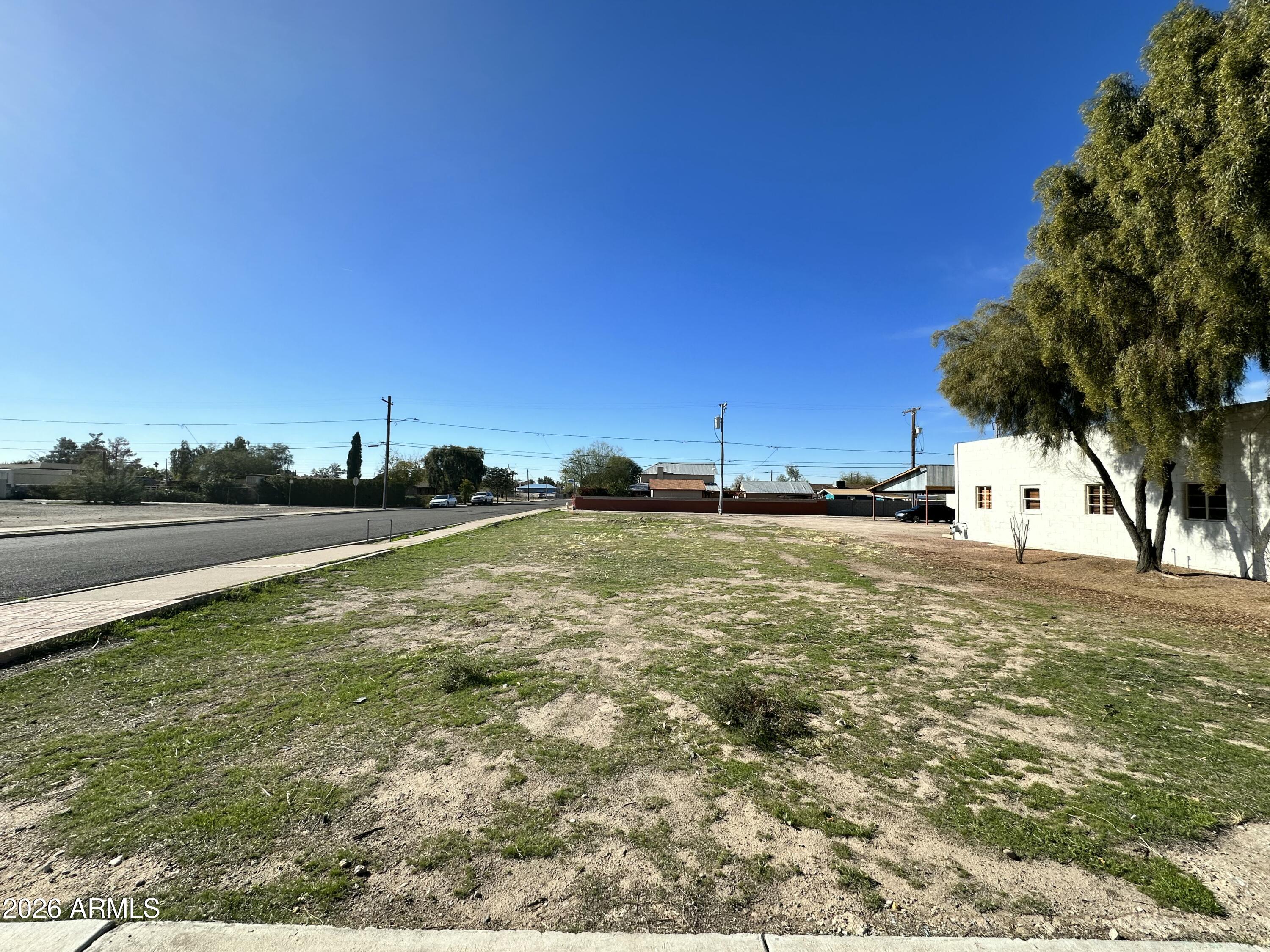 110 North Main Street Florence, AZ 85132 - Photo 5 of 19 a view of an outdoor space and swimming pool