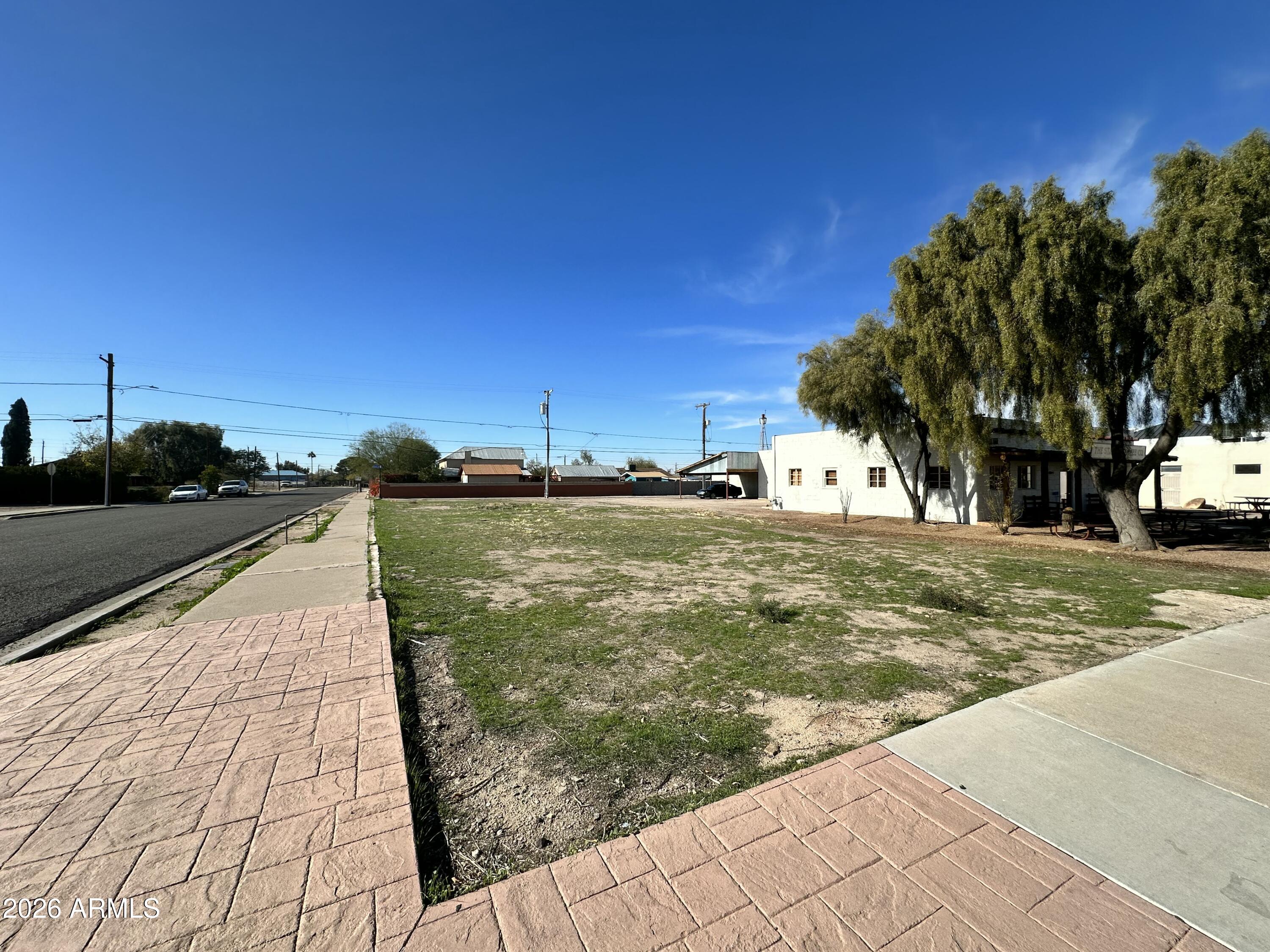 110 North Main Street Florence, AZ 85132 - Photo 6 of 19 a view of a street with houses