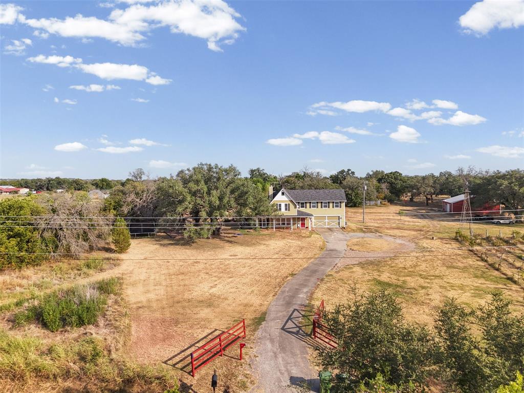 325 Bolton Road Granbury, TX 76049 - Photo 36 of 39 Aerial view of the full 5.529 acre gated, cross-fenced property with a private paved drive. Hood County acreage in Granbury ISD, room to spread out.