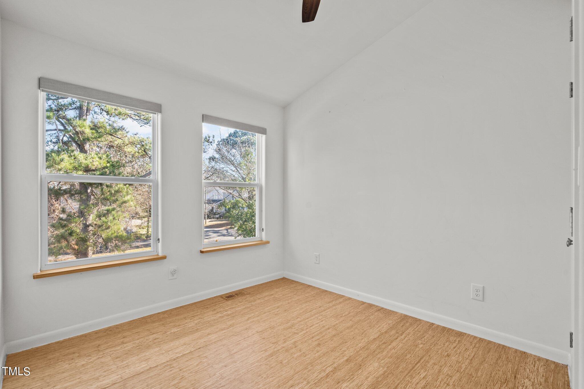 1427 East Lane Street Raleigh, NC 27610 - Photo 25 of 53 an empty room with a window