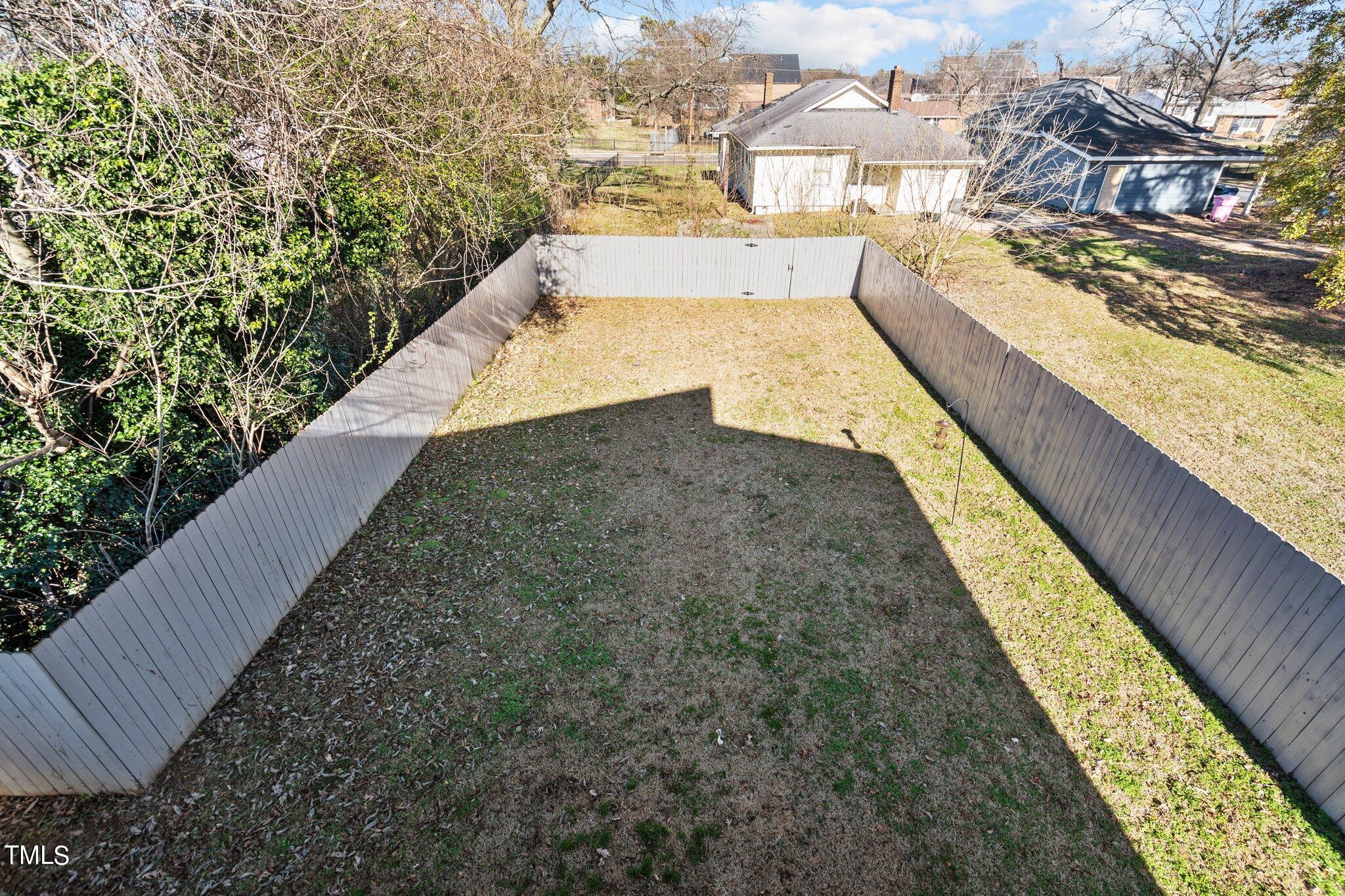 1427 East Lane Street Raleigh, NC 27610 - Photo 34 of 53 a view of a swimming pool with an outdoor space