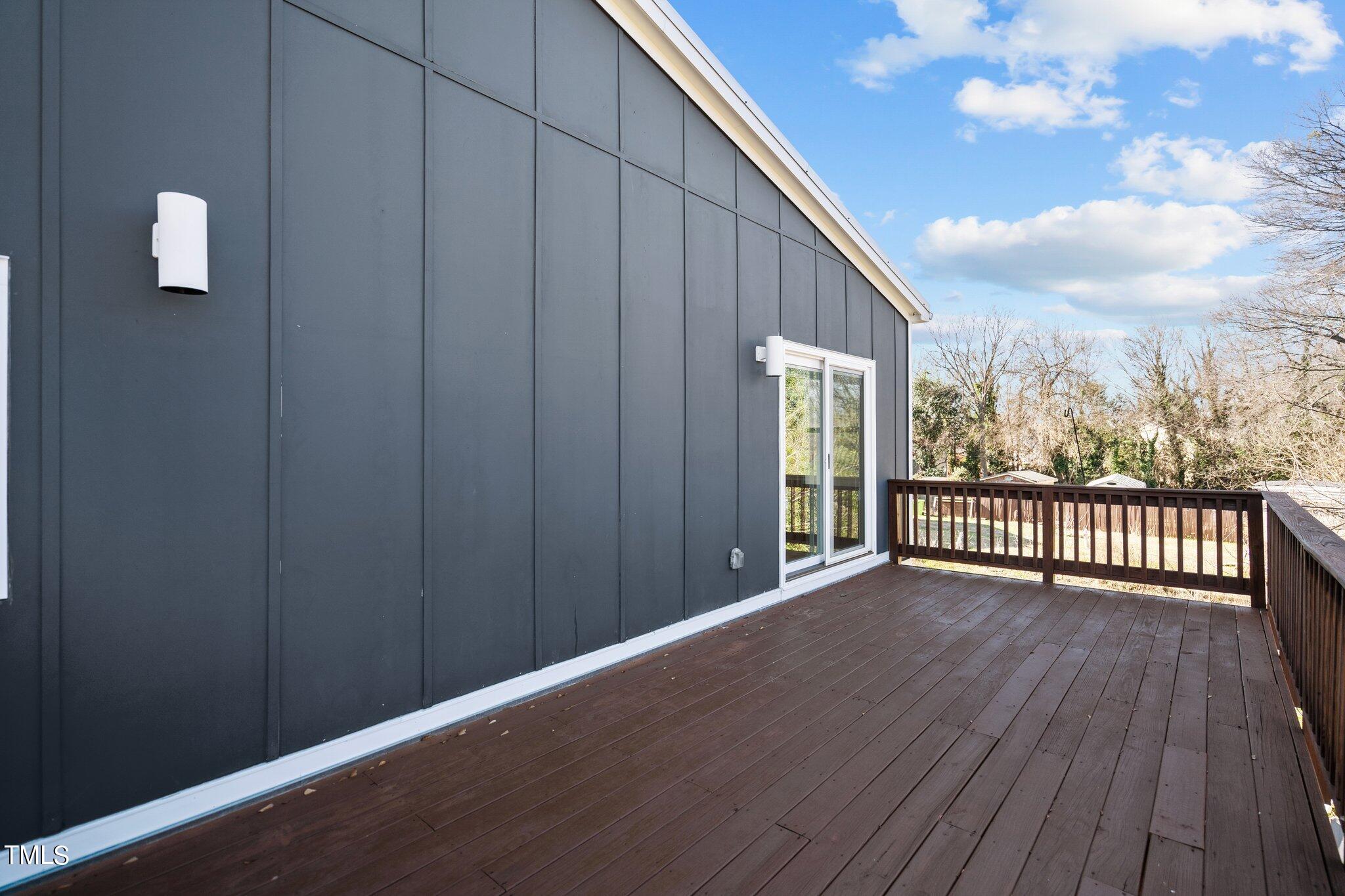 1427 East Lane Street Raleigh, NC 27610 - Photo 35 of 53 a view of a balcony with wooden floor