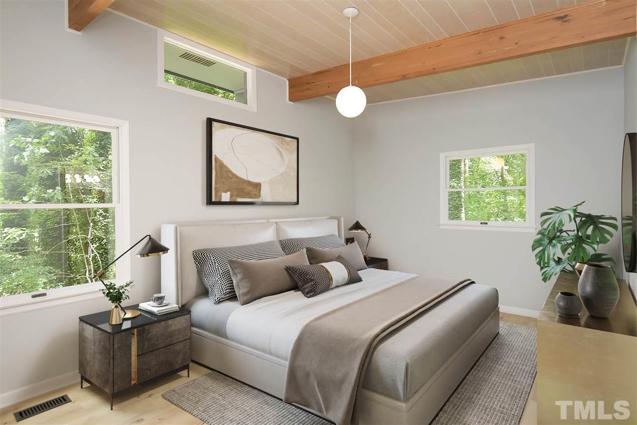 19 Learned Place Durham, NC 27705 - Photo 11 of 30 a bedroom with bed couch and window