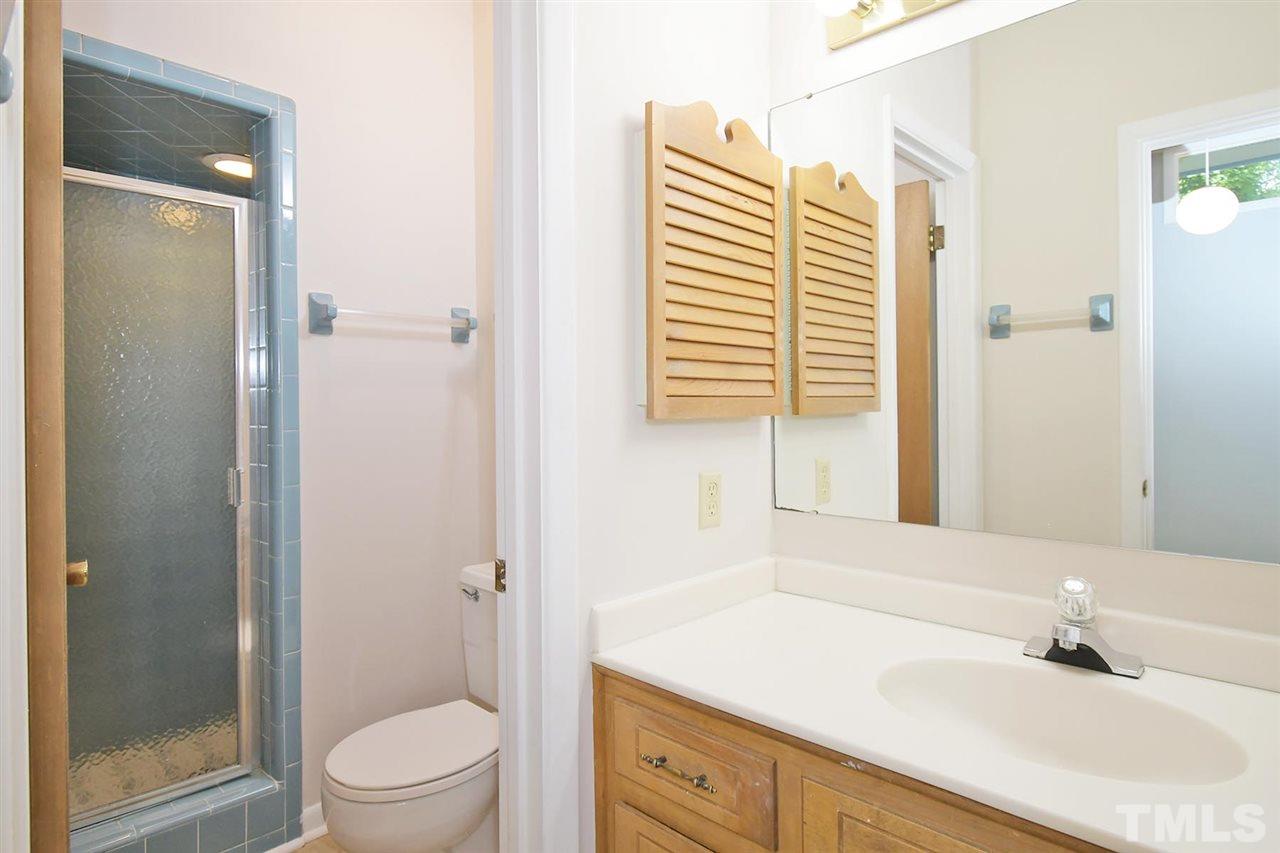 19 Learned Place Durham, NC 27705 - Photo 13 of 30 a bathroom with a sink a toilet and shower