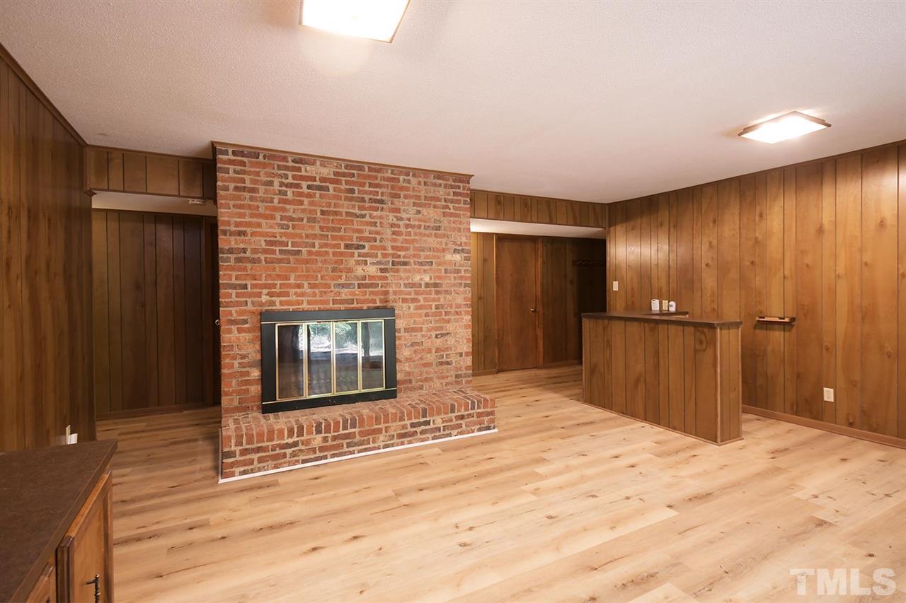 19 Learned Place Durham, NC 27705 - Photo 19 of 30 a view of a livingroom with a fireplace