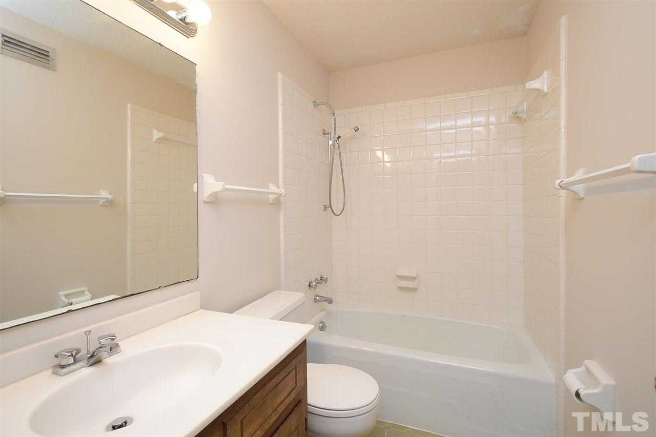 19 Learned Place Durham, NC 27705 - Photo 21 of 30 a bathroom with a sink a toilet and shower